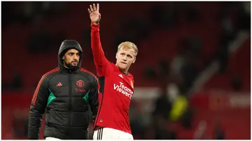 Donny van de Beek gestures to the fans after the Carabao Cup third-round match at Old Trafford. Photo by Martin Rickett.