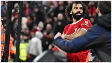 Mohamed Salah celebrates after scoring the opening goal during the Premier League match between Liverpool FC and Newcastle United. Photo: John Powell.