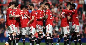 Manchester United players encourage each other before their Premier League match against Norwich City at Old Trafford. Photo by Simon Stacpoole.
