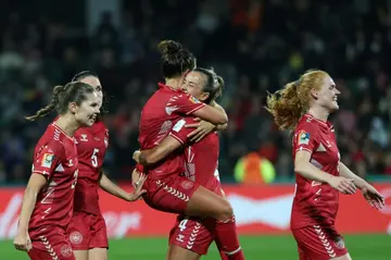 Denmark players celebrate their winner