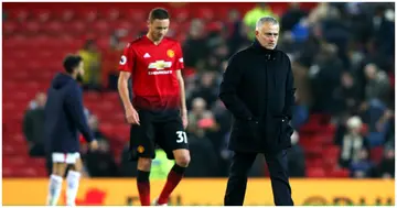 Nemanja Matic and Jose Mourinho look dejected after a Premier League match between Man United and Crystal Palace at Old Trafford. Photo by Alex Livesey.