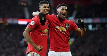 Marcus Rashford celebrates with teammate Anthony Martial after scoring his team's third goal against Brighton & Hove Albion at Old Trafford on November 10, 2019 in Manchester, United Kingdom. (Photo by Michael Regan/Getty Images)
