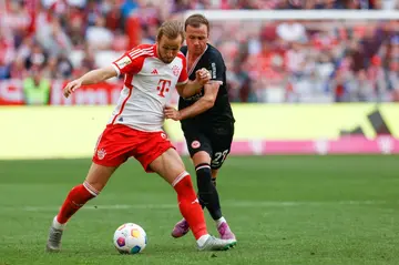 'It's possible': Bayern Munich forward Harry Kane in action against Eintracht Frankfurt on Saturday when he scored twice