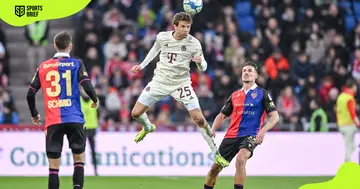 Bayern Munchen's Thomas Müller battles for the ball during a match.