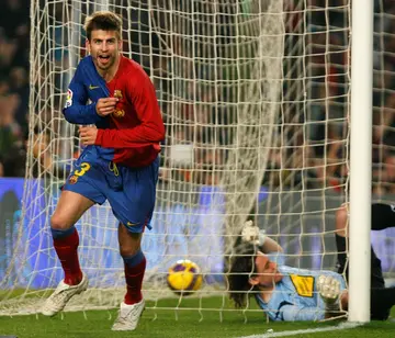Gerard Pique celebrates during the 6-2 rout of Real Madrid in 2009.