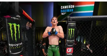 Cameron Saaiman enters the Octagon.