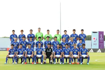 The Japan squad poses for a group photo ahead of a training session for FIFA World Cup Qatar 2022