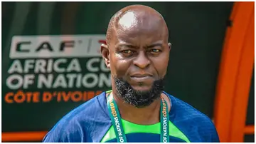 Finidi George reacts to rumours about having disagreements with some Super Eagles top stars during his unveiling in Abuja on Monday, May 13. Photo: @Brilafm889.
