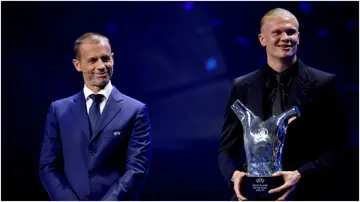 Erling Haaland holds the UEFA Men’s Player of the Year award during the UEFA Champions League 2023/24 Group Stage draw at Grimaldi Forum. Photo by Valerio Pennicino.