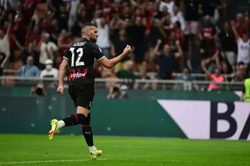 Ante Rebic celebrated after scoring his second for Milan