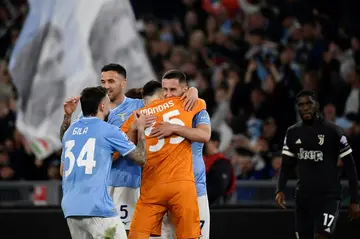 Adam Marusic (C-R) celebrates after scoring Lazio's late winner against Juventus