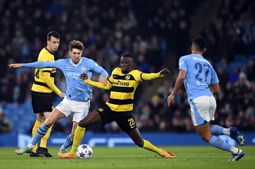 Manchester City defender John Stones (2L) was injured against Young Boys