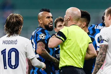 Arturo Vidal clashes with the referee and players during Inter Milan's previous clash with Real Madrid.