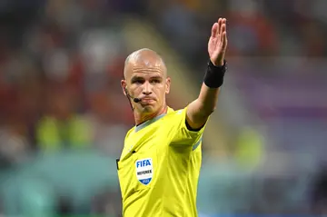 Victor Gomes officiating during a game.