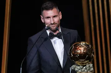 Lionel Messi with his trophy after winning the Ballon d'Or for the eighth time