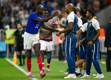 Jean-Philippe Mateta celebrates scoring one of his two goals in France's 3-1 win over Egypt in the Olympic men's football semi-finals