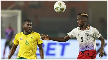 Namibia's Bethuel Muzeu battles South Africa's Aubrey Modiba for the ball during an Africa Cup of Nations 2023 Group E football match.