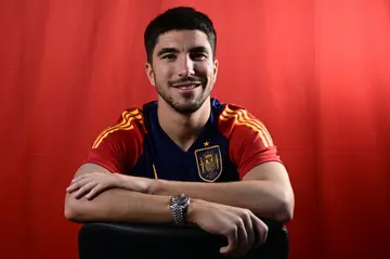 Spain midfielder Carlos Soler poses for a picture during an interview with AFP at Qatar University in Doha