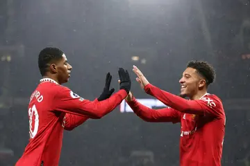 Manchester United forward Marcus Rashford (left) celebrates his goal against Brentford