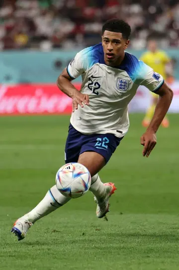 England's midfielder Jude Bellingham on the charge during his World Cup debut on Monday