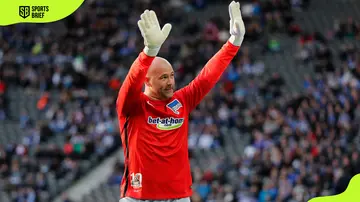 Goalkeeper Gabor Kiraly waves to his fans