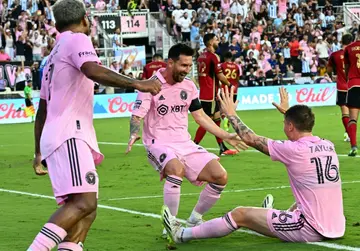 Lionel Messi celebrates scoring Inter Miami's second goal with team-mate Robert Taylor -- Messi and Taylor scored twice each in the 4-0 win over Atlanta United on Tuesday