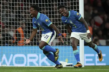 Brazil's Endrick (L) celebrates with Vinicius Junior after his winner against England. 
