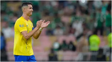 Cristiano Ronaldo applauds the fans after the Saudi Pro League match between Al-Ahli SFC and Al-Nassr at King Abdullah Sports City. Photo by Khalid Alhaj.