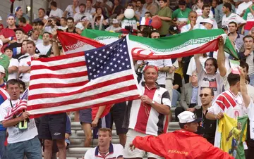 Iranian and US supporters attend the 1998 World Cup; the two sides meet agains at the 2022 tournament on Tuesday