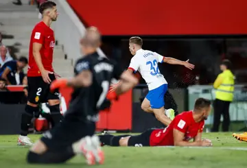 Barcelona midfielder Fermin Lopez celebrates after scoring his team's second goal to level the clash against Real Mallorca