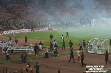 Irate fans destroy equipment at Abuja Stadium after Nigeria failed to qualify for World Cup.