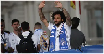 Marcelo Vieira of Real Madrid is seen as the Real Madrid team arrives by bus for the traditional celebration at Cibeles in Madrid. Photo by Burak Akbulut.