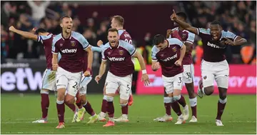 West Ham players celebrate after Said Benrahma of West Ham United scored the winning penalty in the shootout during the Carabao Cup Round of 16 against Man City (Photo by Mike Hewitt/Getty Images)