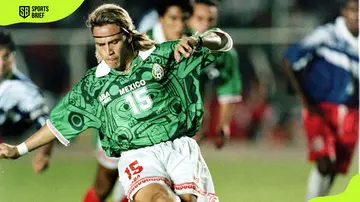 Mexico's Luis Hernandez takes a penalty shot