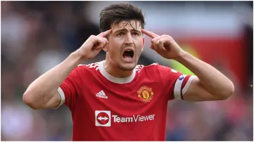 Harry Maguire reacts during the Premier League match between Manchester United and Aston Villa at Old Trafford. Photo by Laurence Griffiths.