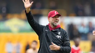 Jurgen Klopp waves to the fans after the Premier League match between Wolverhampton Wanderers and Liverpool at Molineux. Photo by Gustavo Pantano.