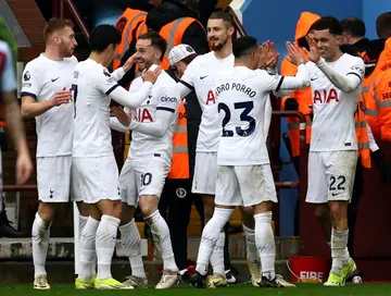 Tottenham celebrate during their victory at Aston Villa