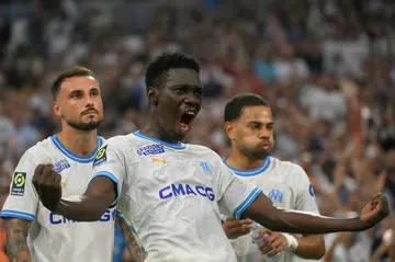 Ismaila Sarr (C) celebrates after sealing victory for  Marseille against Brest