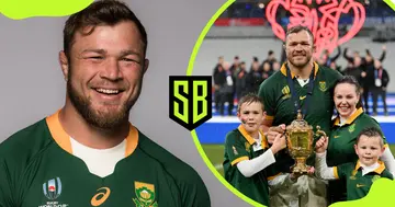 Duane Vermeulen poses with his wife and children