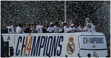 Real Madrid team arrives by bus at the traditional celebration at Cibeles, where thousands of fans celebrate the 14th UEFA Champions League victory. Photo by Burak Akbulut.
