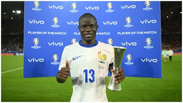 N'Golo Kante poses for a photo with the Player of the Match award after the UEFA EURO 2024 group stage match between Austria and France at Dusseldorf Arena on June 17, 2024. Photo: Michael Regan.