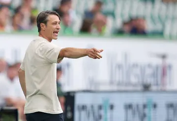 Pointing the way: Niko Kovac guided Wolfsburg to a 2-2 draw with Bremen in his first Bundesliga game in charge and now leads them to Munich