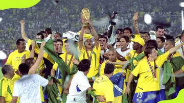 Brazil players celebrate winning the 2002 World Cup