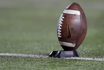 A Nike football on a kicking tee during an NCAA football game at California Memorial Stadium on November 14, 2015, in Berkeley, California