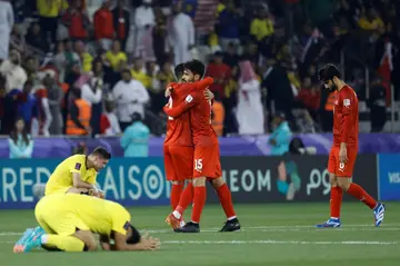 Bahrain's players celebrate victory