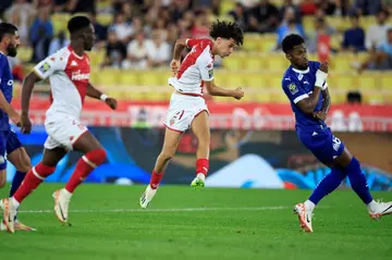 Maghnes Akliouche (C) fires in his second goal and Monaco's third in their 3-2 win over Marseille on Saturday