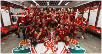 Liverpool players celebrating after winning the Premier League title in 2020. Photo by Andrew Powell.
