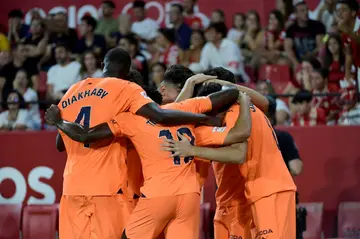 Winning moment: Valencia midfielder Javi Guerra celebrates with teammates