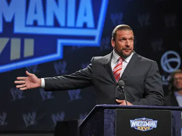 How much does Triple H make a year?