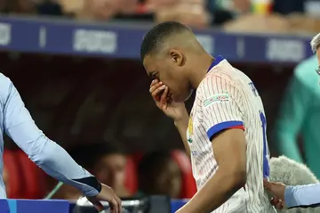 Kylian Mbappe comes off with a bloodied nose at the end of France's win over Austria in Duesseldorf